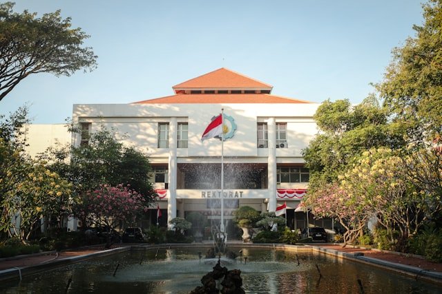 A building with a fountain in front of it